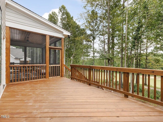 wooden terrace with a sunroom