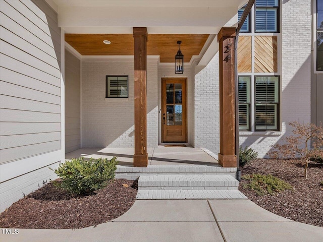 entrance to property with a porch