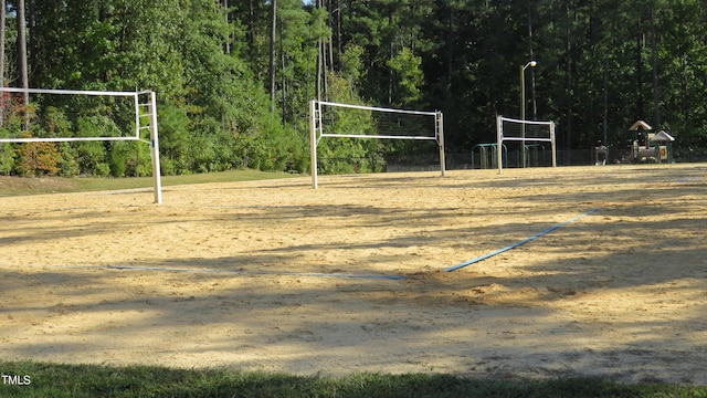 view of property's community featuring volleyball court