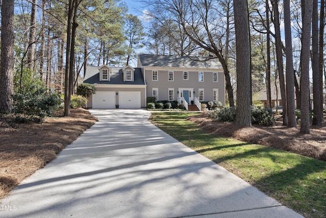 colonial house featuring a garage