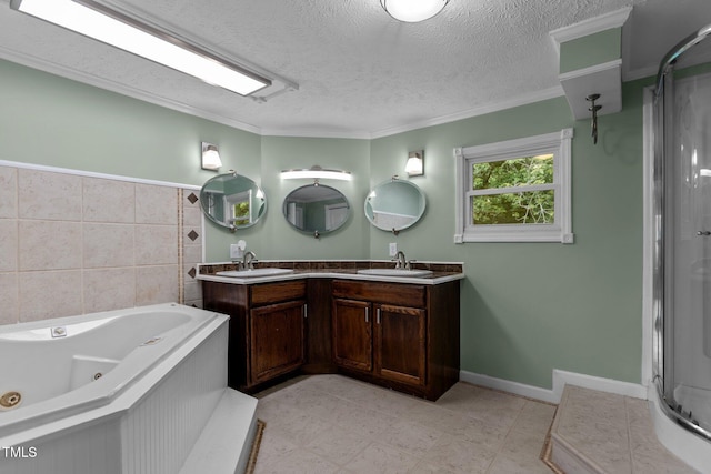 1167 John D Winstead Rd, Roxboro, NC 27574 - full bath with a shower stall, double vanity, a whirlpool tub, ornamental molding, and a textured ceiling