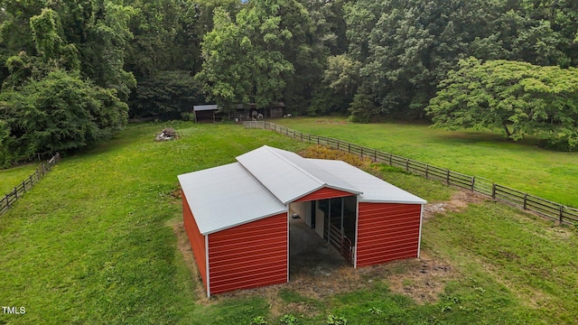 1167 John D Winstead Rd, Roxboro, NC 27574 - view of pole building featuring an exterior structure and a forest view
