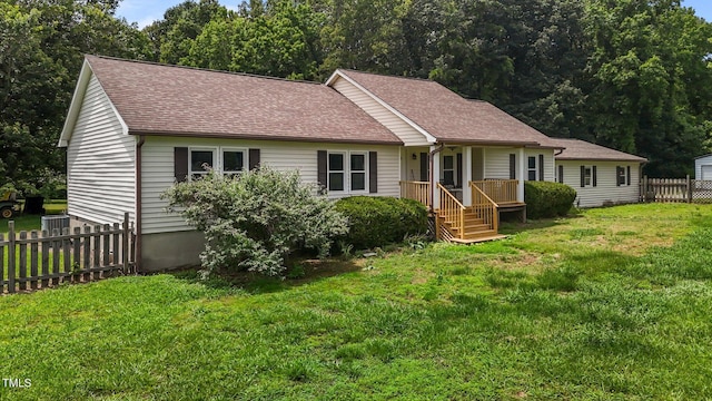 1167 John D Winstead Rd, Roxboro, NC 27574 - ranch-style house featuring a shingled roof and central AC