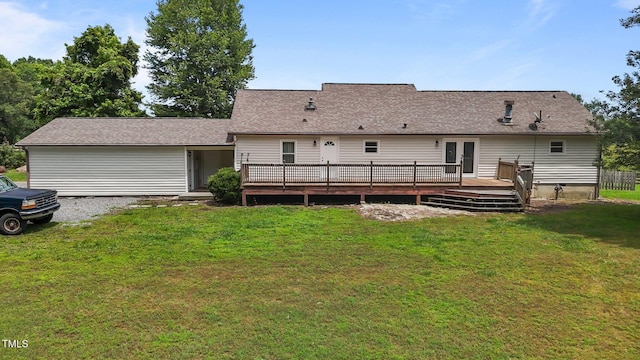 1167 John D Winstead Rd, Roxboro, NC 27574 - back of property with a wooden deck, a yard, and a shingled roof