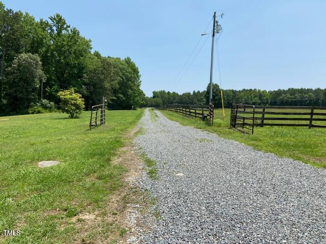 1167 John D Winstead Rd, Roxboro, NC 27574 - view of dirt / gravel road featuring a rural view
