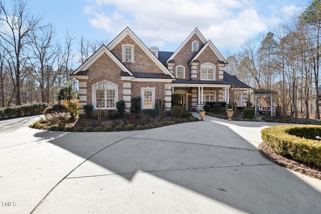 craftsman inspired home featuring covered porch