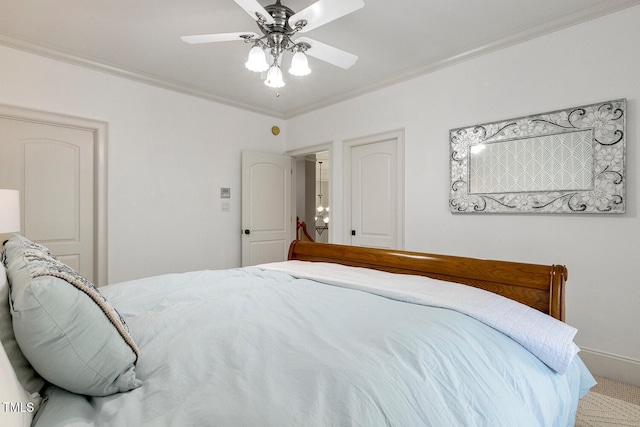 bedroom featuring ornamental molding and ceiling fan