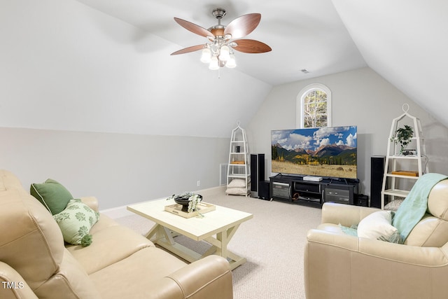 living room featuring lofted ceiling, carpet floors, and ceiling fan