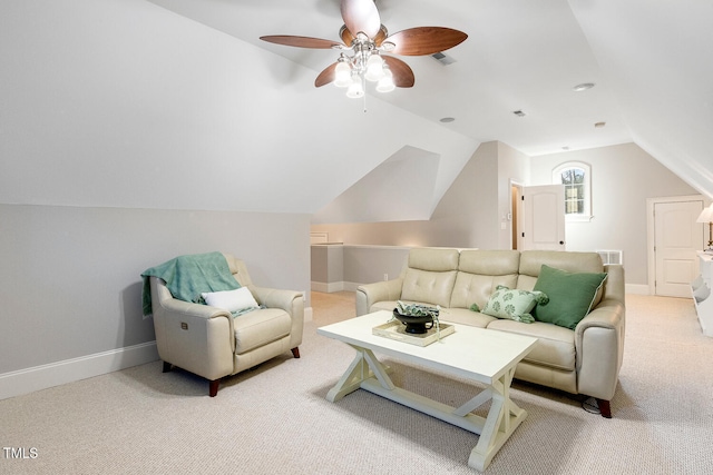 living room featuring lofted ceiling, light colored carpet, and ceiling fan