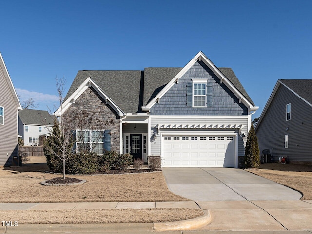 view of front of home with a garage