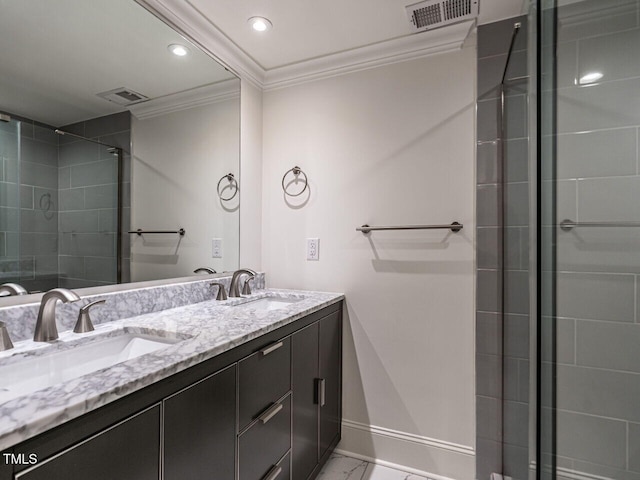 bathroom featuring vanity, crown molding, and a tile shower