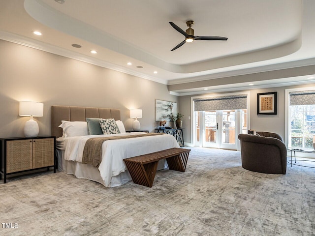 bedroom featuring french doors, crown molding, access to outside, a raised ceiling, and light colored carpet