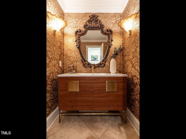 bathroom featuring vanity, crown molding, and tile patterned floors