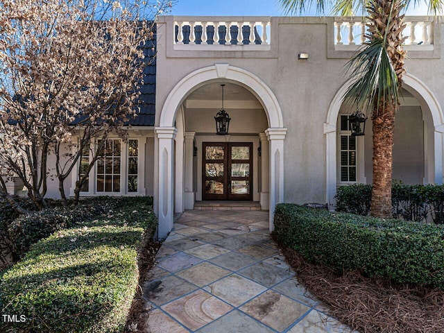 doorway to property featuring french doors