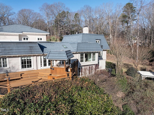 rear view of house with a deck