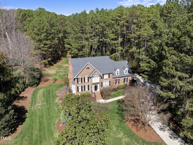 aerial view with a wooded view