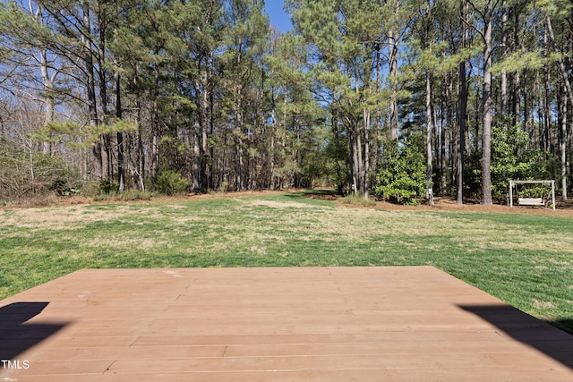 view of yard with a wooden deck