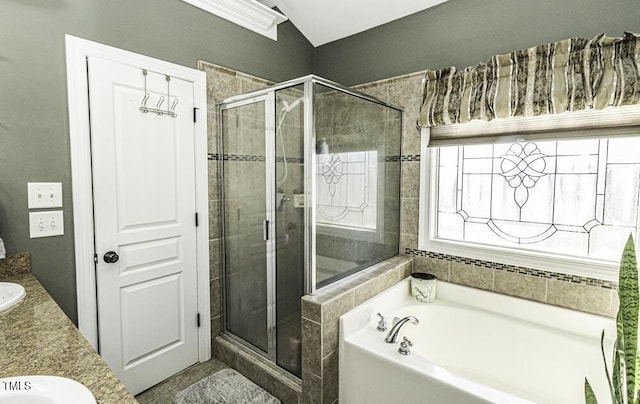 bathroom featuring vanity and plus walk in shower