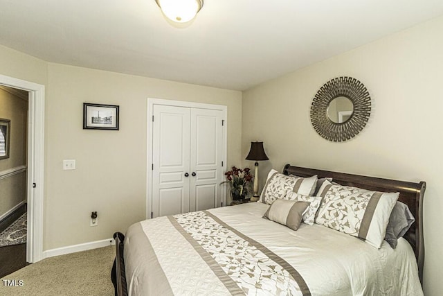 carpeted bedroom featuring a closet