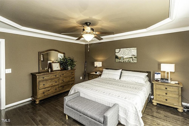 bedroom featuring dark wood-type flooring, ornamental molding, and ceiling fan