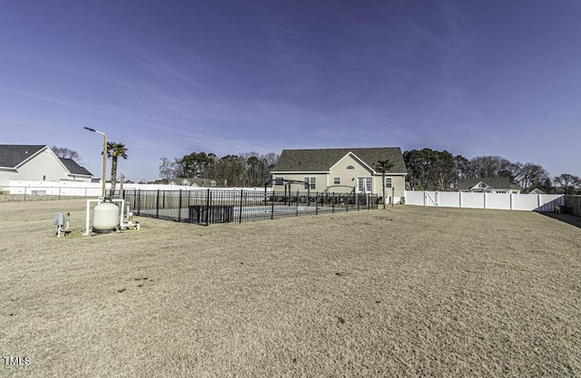 view of yard with a pool