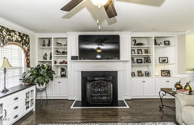 living room with ornamental molding, dark hardwood / wood-style floors, and ceiling fan