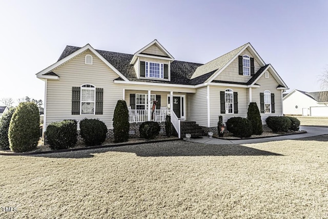 view of front of property featuring covered porch