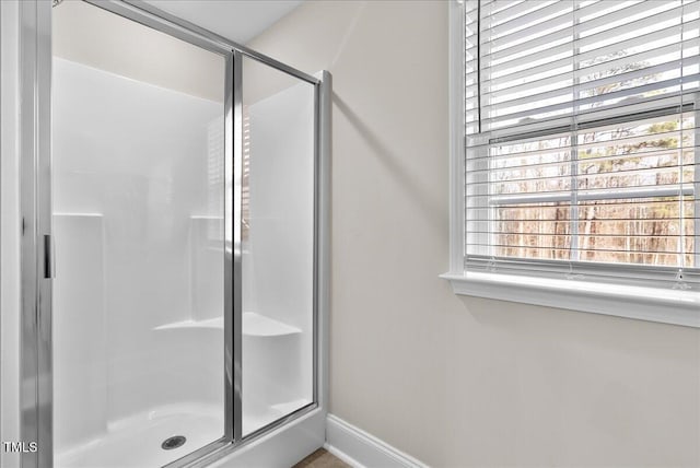 bathroom with an enclosed shower