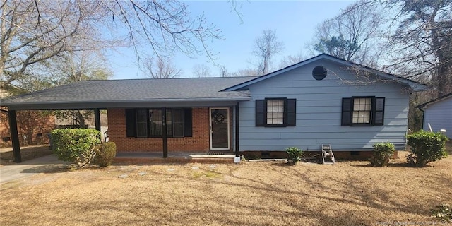568 Alleghany Rd, Fayetteville, NC 28304 - ranch-style home featuring crawl space, an attached carport, a front lawn, a shingled roof, and a porch