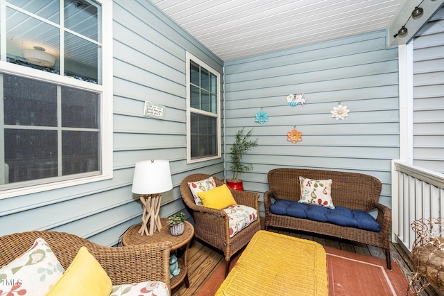 wooden terrace with a porch