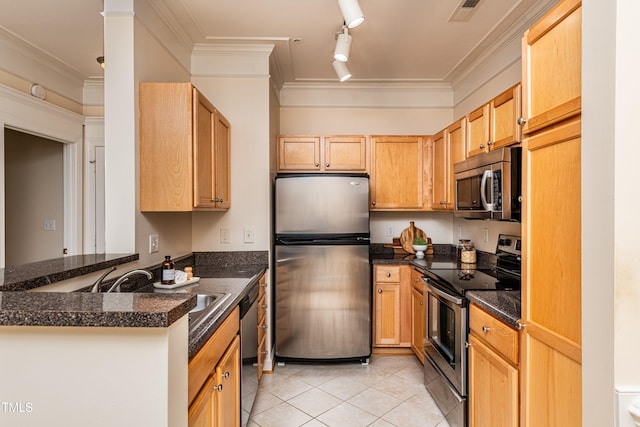 kitchen with crown molding, appliances with stainless steel finishes, kitchen peninsula, and light tile patterned floors