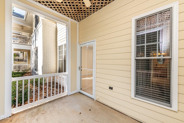 doorway to property featuring covered porch