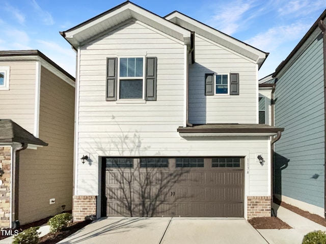 view of front of property featuring a garage