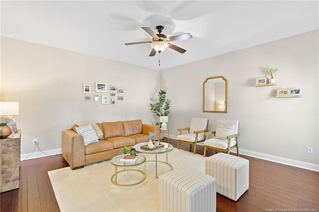 living room featuring dark hardwood / wood-style floors and ceiling fan