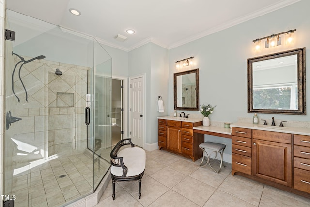 bathroom with tile patterned flooring, crown molding, vanity, and a shower with shower door