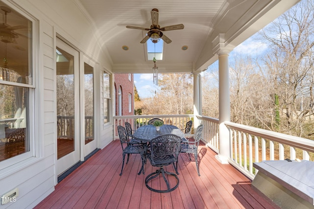 wooden deck with ceiling fan