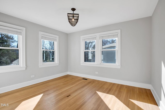 empty room featuring hardwood / wood-style floors