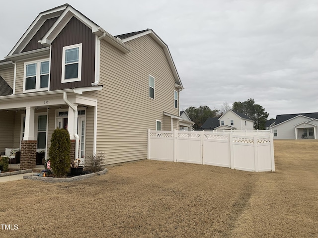 view of home's exterior featuring a yard