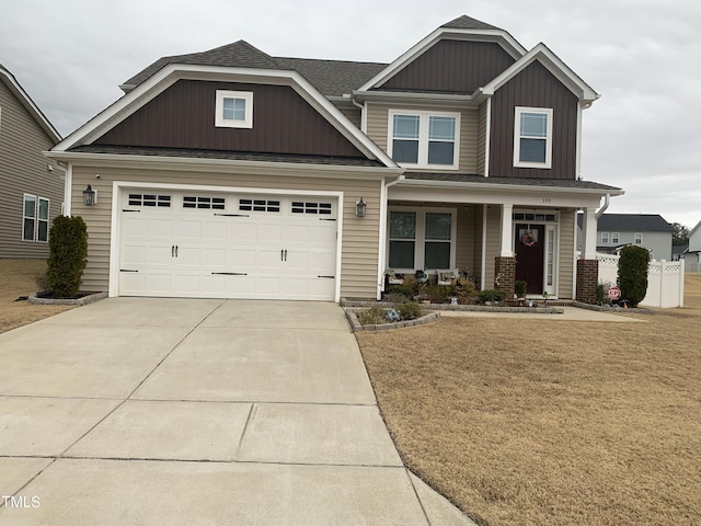 craftsman house with a front lawn and a porch