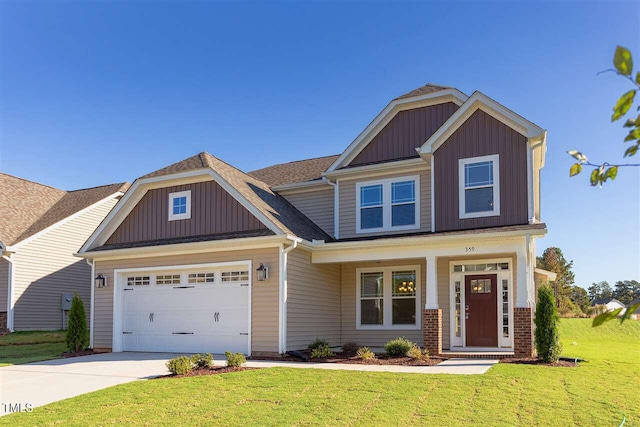 craftsman inspired home featuring board and batten siding, a garage, a front lawn, and concrete driveway