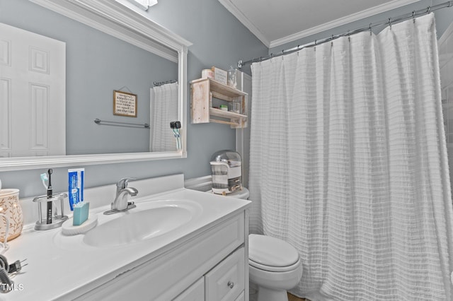 full bathroom with vanity, crown molding, and toilet