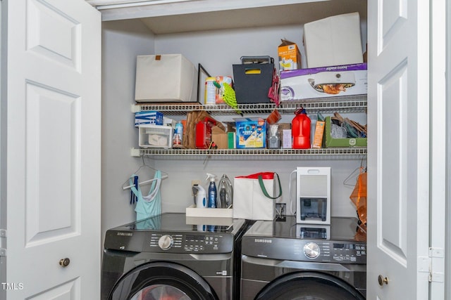 laundry room featuring washer and clothes dryer