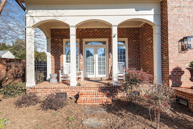 2035 Stuart Ct, Burlington, NC 27215 - property entrance with brick siding and a porch