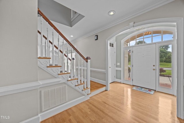 2035 Stuart Ct, Burlington, NC 27215 - entryway featuring crown molding, wood finished floors, stairs, recessed lighting, and baseboards
