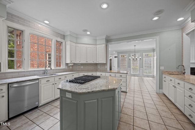 2035 Stuart Ct, Burlington, NC 27215 - kitchen featuring stainless steel appliances, a sink, light tile patterned floors, a chandelier, and recessed lighting