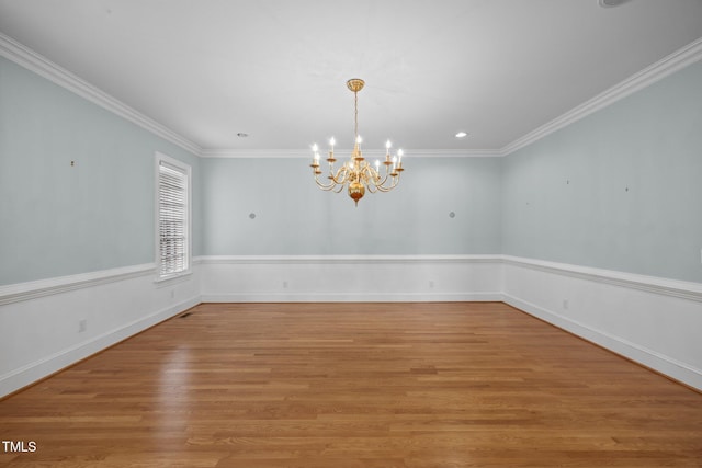 2035 Stuart Ct, Burlington, NC 27215 - unfurnished room featuring a chandelier, ornamental molding, light wood-style floors, baseboards, and recessed lighting