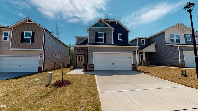 view of front facade with a garage and a front yard