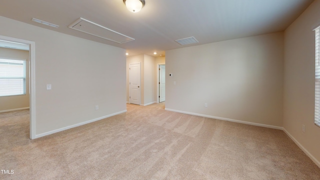 view of carpeted spare room