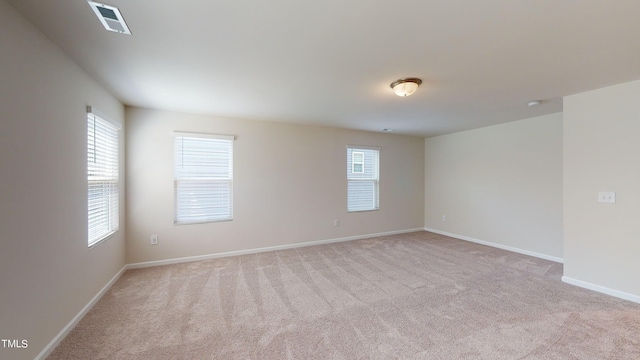 view of carpeted spare room