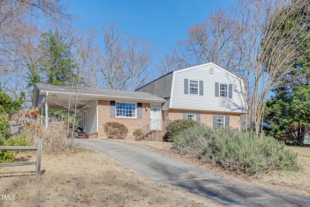 split level home with a carport